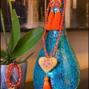 Set necklace , earrings and bracelets